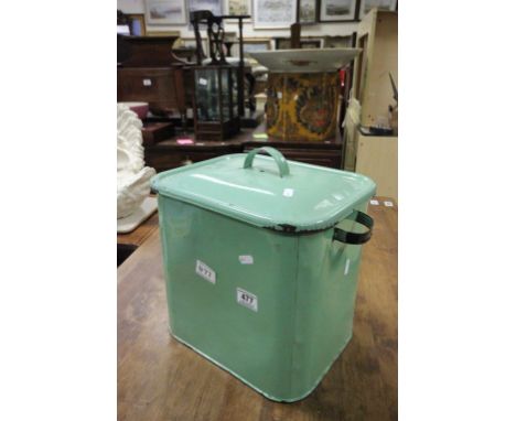 A green enamel bread bin.