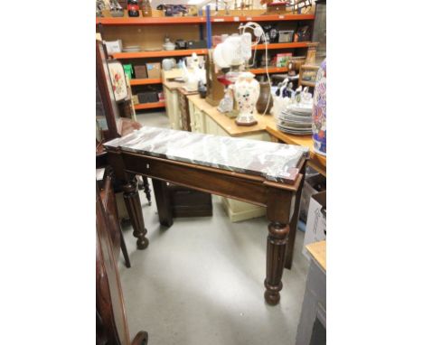 19th century mahogany console table with marble top, raised on reeded legs and bun feet.