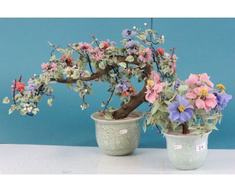 Two ornate Chinese handmade glass plants with ceramic pots