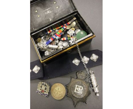 Old cash tin with a collection of vintage Police items to include badges, whistle, buttons etc