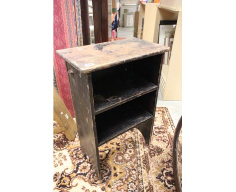 A vintage pine bookcase.