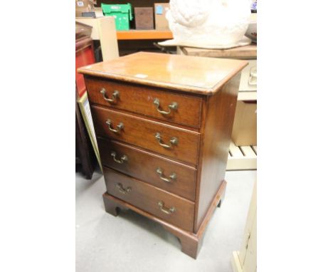Early 19th century Small Oak Chest of Four Drawers raised on bracket feet