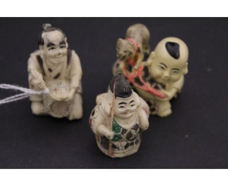 Group of three netsuke style resin carvings of baby with cat, basket maker and a fisherman 