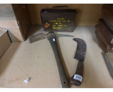 A military trench axe, ammo box and vintage axe