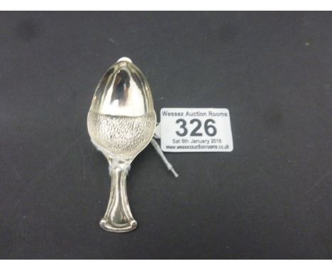 Silver caddy spoon in the form of an acorn