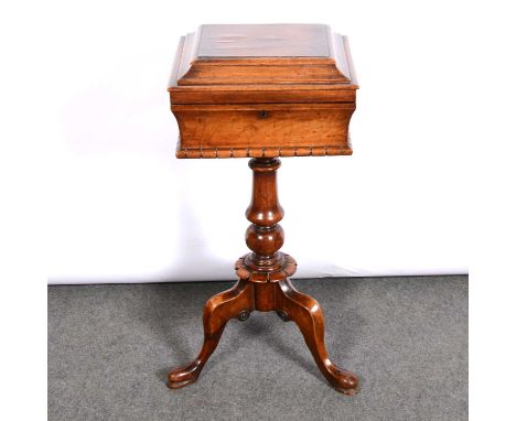 William IV walnut pedestal work table, adapted from a teapoy, the hinged lid enclosing a fitted tray interior, turned column,