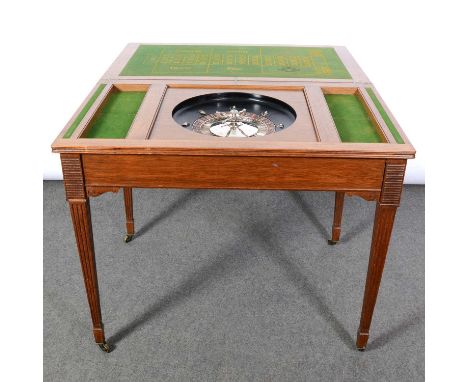 Edwardian oak games table, rectangular double foldover top incorporating a baize covered card table and a roulette wheel, pla