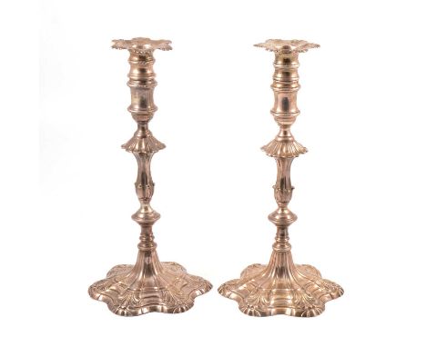 Matched pair of silver candlesticks, Ebenezer Coker, London 1762 and 1765, each with a tall removable sconce, 27.5cm, 38oz gr