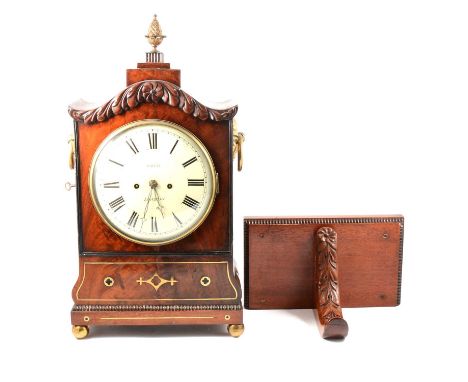 William IV mahogany bracket clock and bracket, the case with an acorn finial, carved and scrolled pediment, brass inlay, side