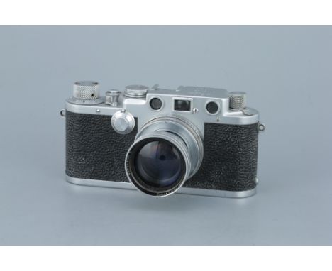 A Leica IIIf 'Black Dial' Rangefinder Camera,chrome, serial no. 551911, with Leitz Summitar f/2 50mm lens, chrome, serial no.