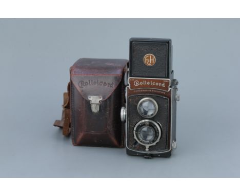 A Rollei Rolleicord II Type I TLR Camera,serial no. 1812829, with Carl Zeiss Jena Triotar f/3.5 75mm lens, body, F, shutter w