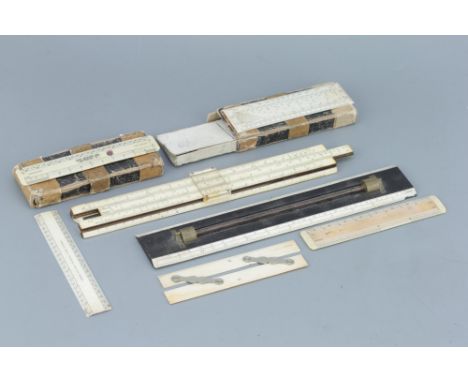 Collection Of Rulers,Including a 12in ivory &amp; ebony roller rule (chip to edge), a 6in ivory rule by Stanley, a 6in parall