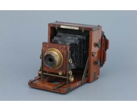 A J. Lancaster &amp; Son Quarter Plate Mahogany Camera,with J. Lancaster &amp; Sons f/8 brass lens, body, G, lens, VG, with o