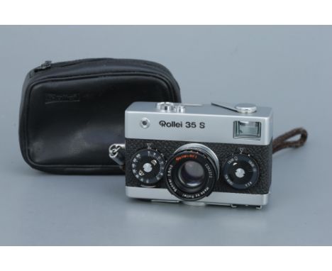 A Rollei 35 S Compact Camera,chrome, with Rollei-HFT Sonnar f/2.8 40mm lens, body, VG, shutter working, lens, VG, some light 