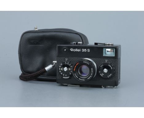 A Rollei 35 S Compact Camera,black, with Rollei-HFT Sonnar f/2.8 40mm lens, body, G-VG, shutter working, slow speeds sticking