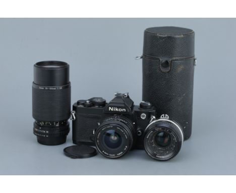 A NIkon FM SLR Camera,black, with Sigma Super-Wide II f/2.8 24mm lens, body, G, shutter working, lens, G, some light fungus, 