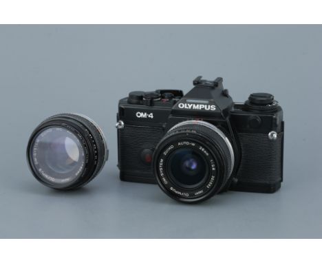 An Olympus OM-4 SLR Camera,with Zuiko f/1.8 50mm and Zuiko f/2.8 28mm lenses, body, G-VG, shutter untested, lenses, F-G, some