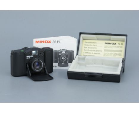 A Minox 35 PL Camera,with Color-Minotar f/2.8 35mm lens, shutter untested, in maker's box