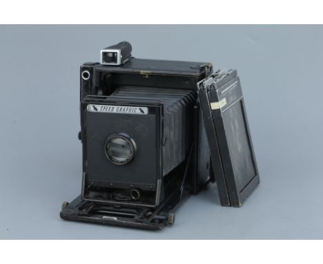 A Graflex Speed Graphic 5x4" Press Camera,with Taylor Hobson Cooke Anastigmat f/4.5 5¾" lens, body, F, shutter fires but accu