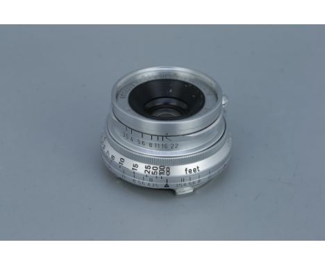 A Leitz Summaron f/3.5 35mm Lens,chrome, serial no. 1777029, body, F-G, elements, G, some light cleaning marks and internal h