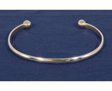 A 9ct gold torque bangle
