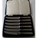 Set of silver handled fruit knives