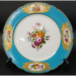 Porcelain cabinet plate with turquoise border and hand painted floral decoration, signed on