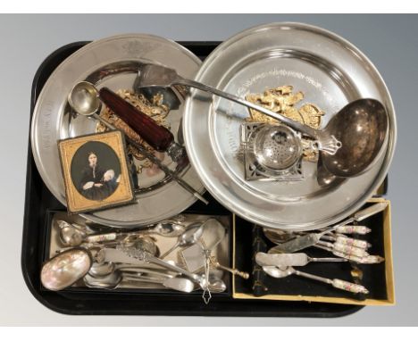 Various EPNS cutlery, a ruby glass tapered scent bottle with silver cap, pair of pewter chargers commemorating the Queen Moth