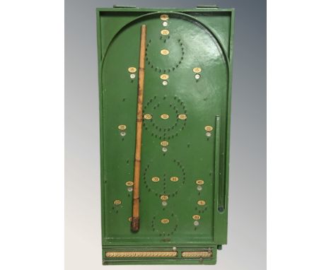 A Chad Valley bagatelle board, length 77 cm.