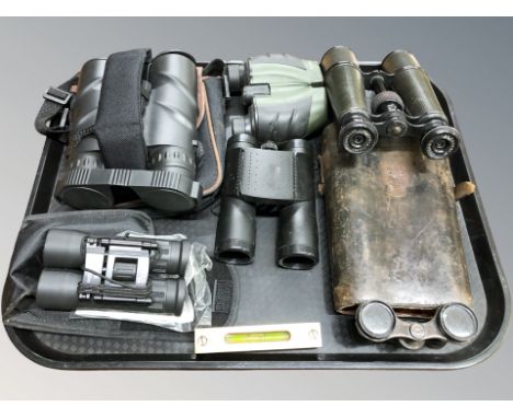 A pair of Negretti & Zambra binoculars, in leather case, pair of racing binoculars stamped 'Made in Germany', four modern pai
