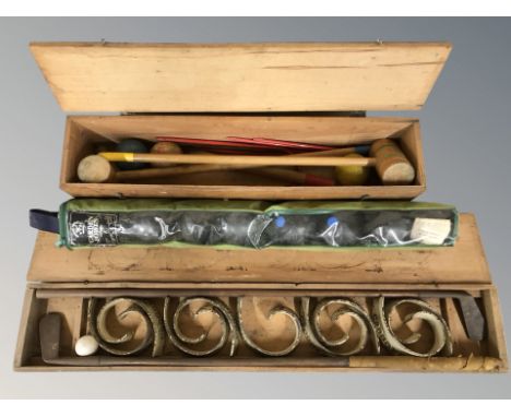 A Triang croquet set in pine box, a further croquet set and a set of lawn bowls. 