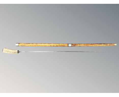 An early 20th century swordstick with antler handle, length 94 cm.