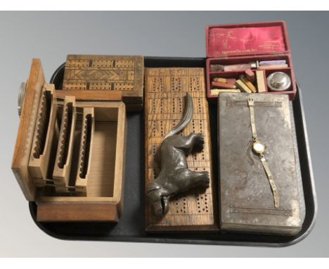 A group of cribbage boards, a lady's Oris gold plated wristwatch, cast iron nutcracker in the form of a dog, cigarette dispen