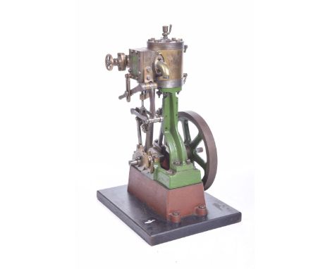 A live steam stationery steam engineWith single piston in green with brass fittings on black base, with single drive wheel, d