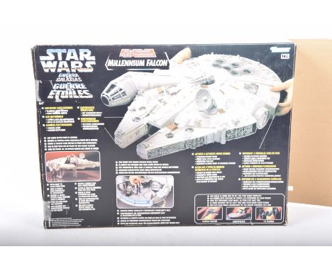 A boxed Star Wars Kenner electric Millennium falcon With four battle sounds electronic lights and authentic movie sounds.