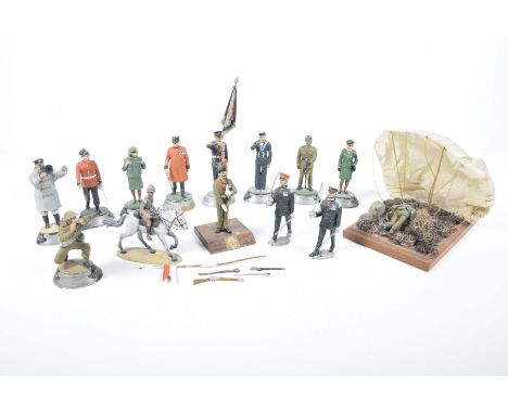 Fourteen large scale metal military figures from various agesIncluding Parachutist on wooden base with parachute, Private Dun