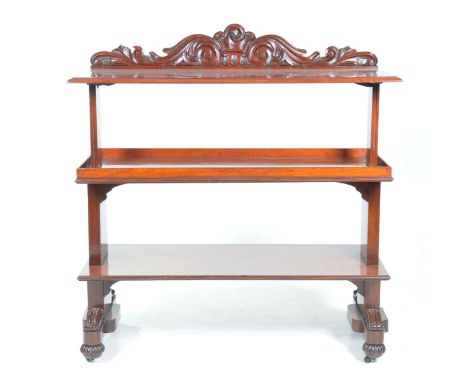 A Victorian mahogany three tier metamorphic dumb waiterHaving a scrolling leafy pediment above the rectangular moulded top su