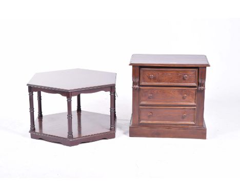 A reproduction mahogany chest and a coffee tableThe chest with a rectangular moulded top above three long drawers on a plinth