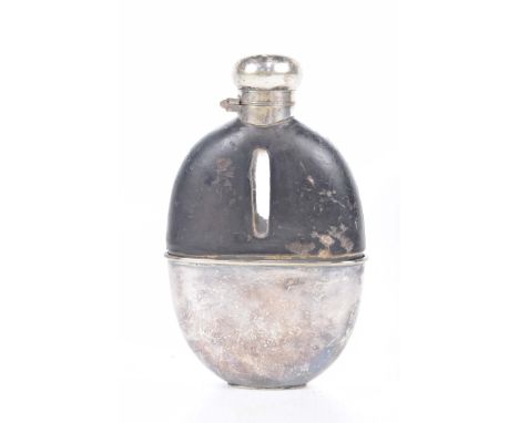 A leather and silver plated glass spirit flask with a detachable plated cup.