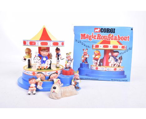A boxed Corgi no. 852 'The Magic Roundabout' carousel Finished in yellow, red with ten figures, including inner card packagin