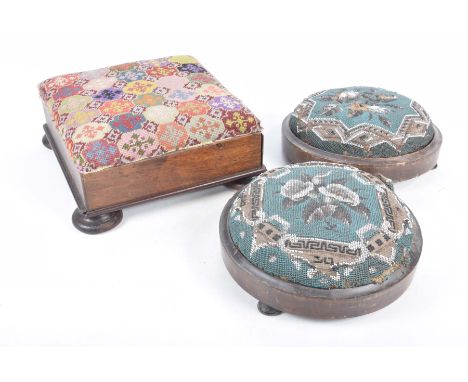 A pair of circular wooden stools with beadwork tops, late 19th/early 20th Century Further wooden footstool with tapestry cove