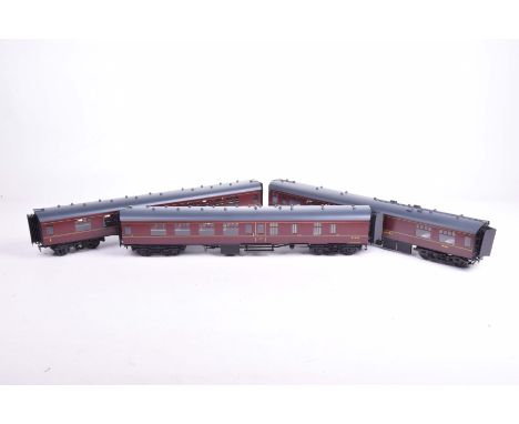 Three Wayoh kit built '0' gauge coaches In maroon BR livery, comprising first class corridor coach M15350, guard'svan/corrido