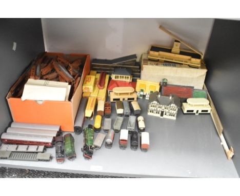 A shelf of Tri-Ang TT Gauge including 4-6-0 Loco &amp; Tender Windsor Castle, 0-6-0 Tank Engines x2, Rolling Stock, Track and