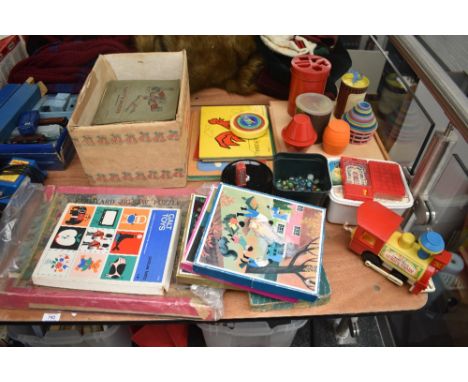 A collection of Childrens vintage Games and Toys including Galt Jigsaws Bonfire, Riding and Skating, Picture Lotto, Chad Vall