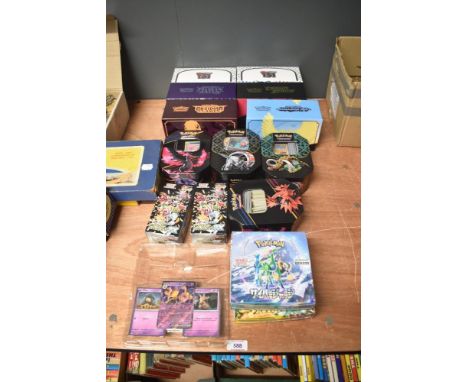 A large collection of modern Pokemon Cards including Scarlet &amp; Violet 151, Paldean Fates, Obsidian Flames and Paradox box