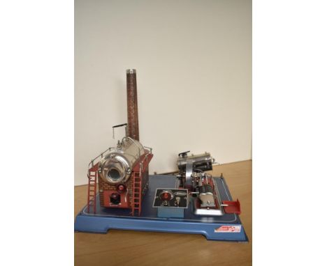 A Wilesco Live Steam D24 Stationary Steam Plant having single horizontal cylinder with piston valve, control panel and boiler