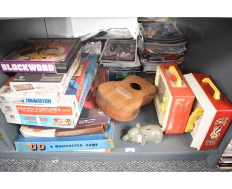 A shelf of vintage Games &amp; Toys including Waddingtons Go and Blockword, Etch A Sketch, Parker Care Bears, MB Operation, D