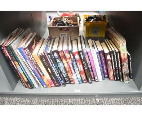 A shelf of BBC and similar Doctor Who related Hard Back Books, mixed sizes, 28 in total along with a Time Travels Pull Out Bo