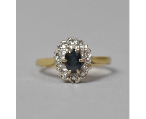 An 18ct Gold Ring Set with Sapphire and Diamonds, Size O, 3.9gms 