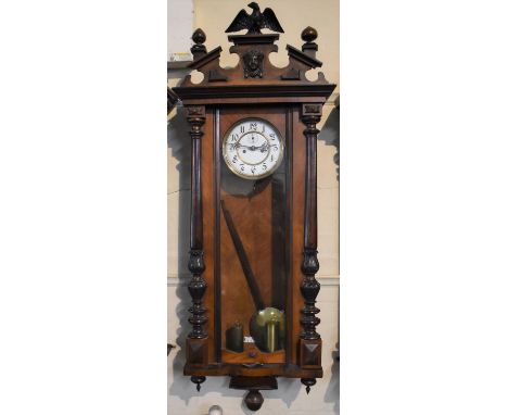 A Late Victorian Walnut Two Weight Vienna Wall Clock with Eagle Finial